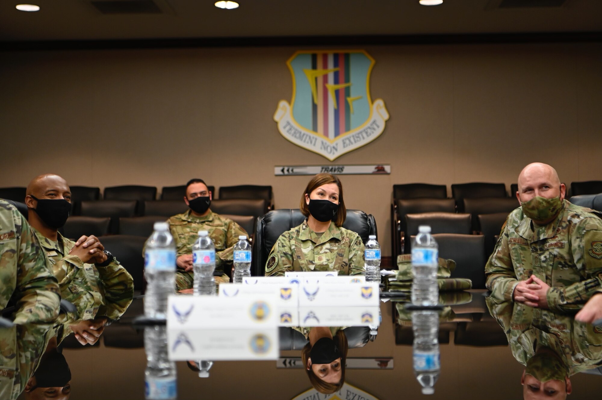 Chief Master Sergeant of the Air Force JoAnne S. Bass talks with 60th Air Mobility Wing leadership about the base’s mission March 24, 2021, at Travis Air Force Base, California. Chief Bass visited Travis AFB to meet the Airmen who demonstrate innovative thinking and enhance the rapid global mobility mission. (U.S. Air Force photo by Senior Airman Karla Parra)