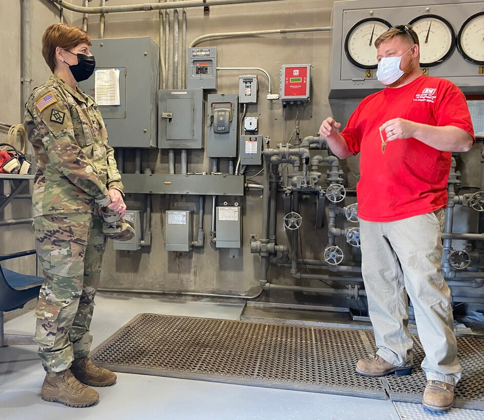 William Kramer, dam operator, briefs Col. Julie Balten, U.S. Army Corps of Engineers Los Angeles District commander, at Painted Rock Dam March 24 near Gila Bend, Arizona. Painted Rock Dam is a major flood control project in the Gila River Drainage Basin, constructed and operated by the Corps’ LA District.