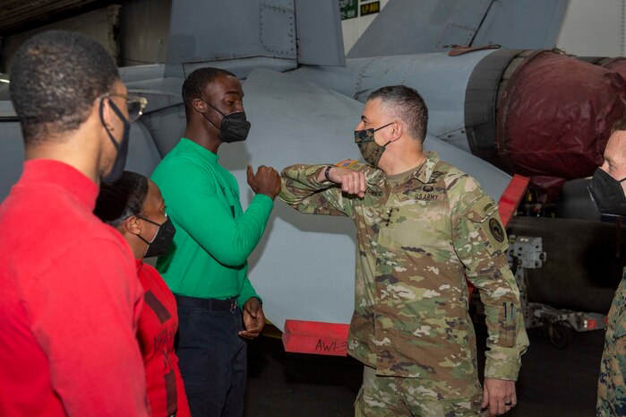 Gen. Stephen Townsend, Commander, United States Africa Command, observes flight operations aboard the Nimitz-class aircraft carrier USS Dwight D. Eisenhower (CVN 69), in the Mediterranean Sea, March 25, 2021.