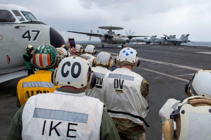 Gen. Stephen Townsend, Commander, United States Africa Command, observes flight operations aboard the Nimitz-class aircraft carrier USS Dwight D. Eisenhower (CVN 69), in the Mediterranean Sea, March 25, 2021.