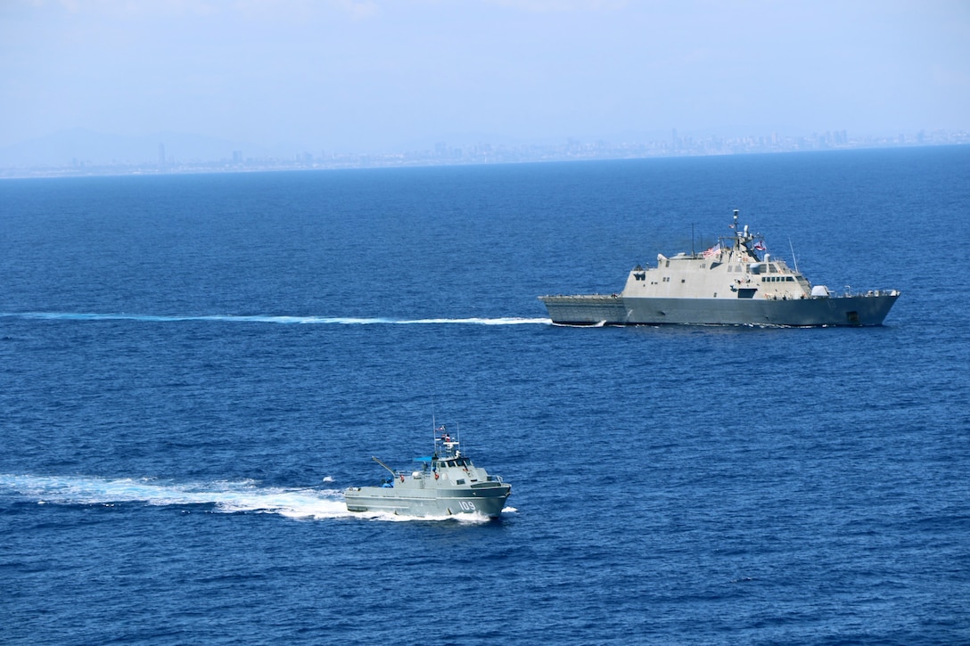 The Freedom-variant littoral combat ship USS Wichita (LCS 13) and the Dominican Republic Coastal Patrol Vessel Orion (GC 109) conduct a bi-lateral maritime exercise, March 24, 2021.