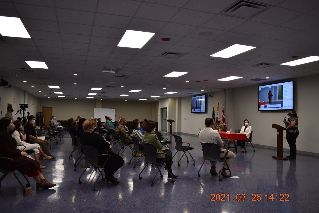 Eman Sundquist, Programs and Project Management Division (PPMD) project manager, speaks to the crowd of attendees about finding her place in a world made for men during the Far East District’s Women’s History Month celebration at District Headquarters, USAG Humphreys, Republic of Korea, Mar. 26, 2021. The event centered on a panel of FED women, who spoke about their experiences as women in the workforce.