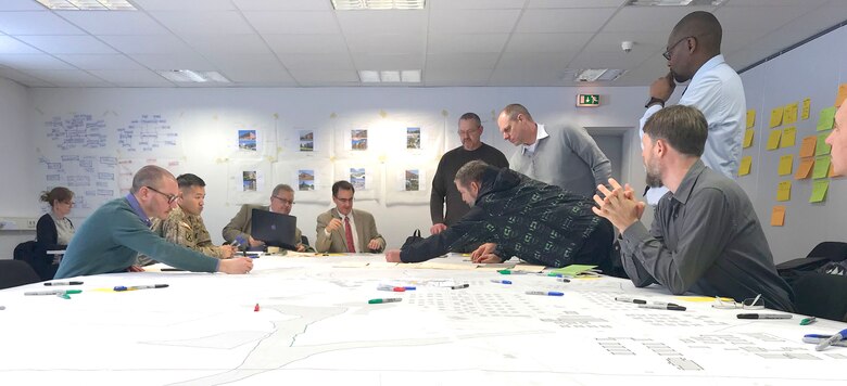 Personnel discuss possible future plans for sections of the camps area of the Grafenwoehr Training Area during collaboration sessions in spring 2019 that were part of creating an Area Development Execution Plan to outline the long-term plan for the area.