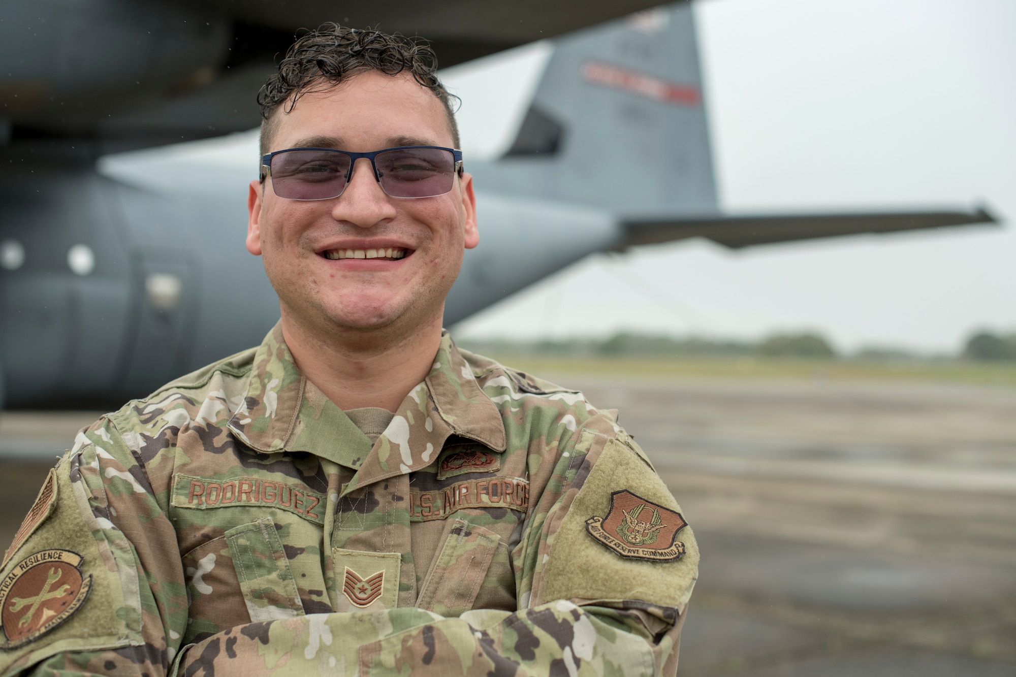 Tech. Sgt. Hector Rodriguez, an aerospace propulsion technician for the 803rd Aircraft Maintenance Squadron at Keesler Air Force Base, Miss., stands in front of one of the 10 C-130Js his squadron is in charge of maintaining March 26, 2021. Rodriguez was awarded the 2020 Air Force Reserve Comand Lt. Gen. Leo Marquez and Maintenance Effectiveness award in the aircraft maintenance civilian technician category for his work during 2020. (U.S. Air Force photo by Staff Sgt. Kristen Pittman)