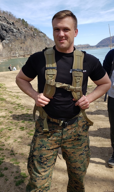 U.S. Marine Corps Gunnery Sgt. Jason Oliver, a recruiter with Recruiting Station Frederick and 4th Marine Corps District recruiter of the quarter, completes a hike during a monthly pool function for Recruiting Substation Martinsburg in Harpers Ferry, West Virginia, March 16, 2021. The monthly pool functions are preformed to both build rapport between poolees and recruiters and to prepare them mentally and physically for the rigors of Marine Corps recruit training.  (U.S. Marine Corps photo by Sgt. Ryan Sammet)