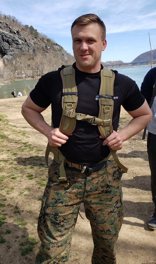 U.S. Marine Corps Gunnery Sgt. Jason Oliver, a recruiter with Recruiting Station Frederick and 4th Marine Corps District recruiter of the quarter, completes a hike during a monthly pool function for Recruiting Substation Martinsburg in Harpers Ferry, West Virginia, March 16, 2021. The monthly pool functions are preformed to both build rapport between poolees and recruiters and to prepare them mentally and physically for the rigors of Marine Corps recruit training.  (U.S. Marine Corps photo by Sgt. Ryan Sammet)