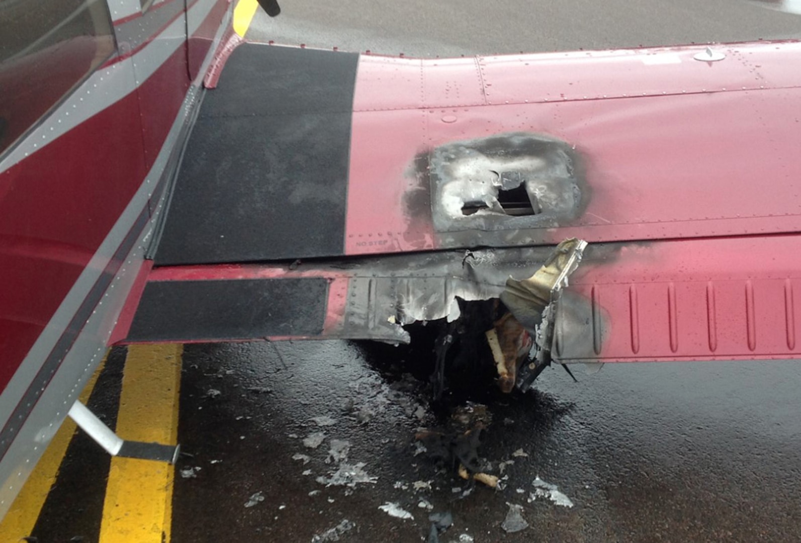 A photo taken in the aftermath of the 158th Fighter Wing Fire Department’s response to an aircraft fire shows damage to the aircraft’s fuselage. (courtesy photo)