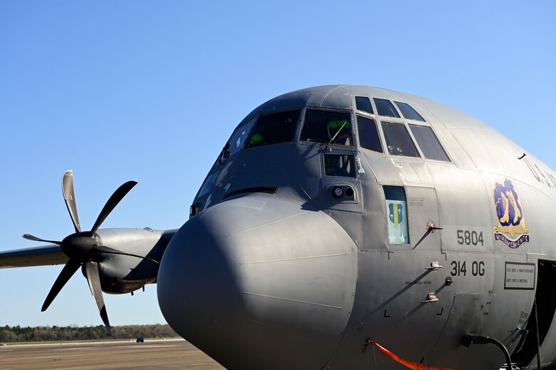 A C-130J Super Hercules rests on the flight line
