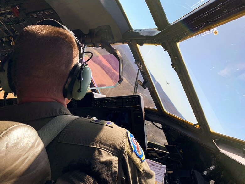 An Airman flies a C-130J Super Hercules.