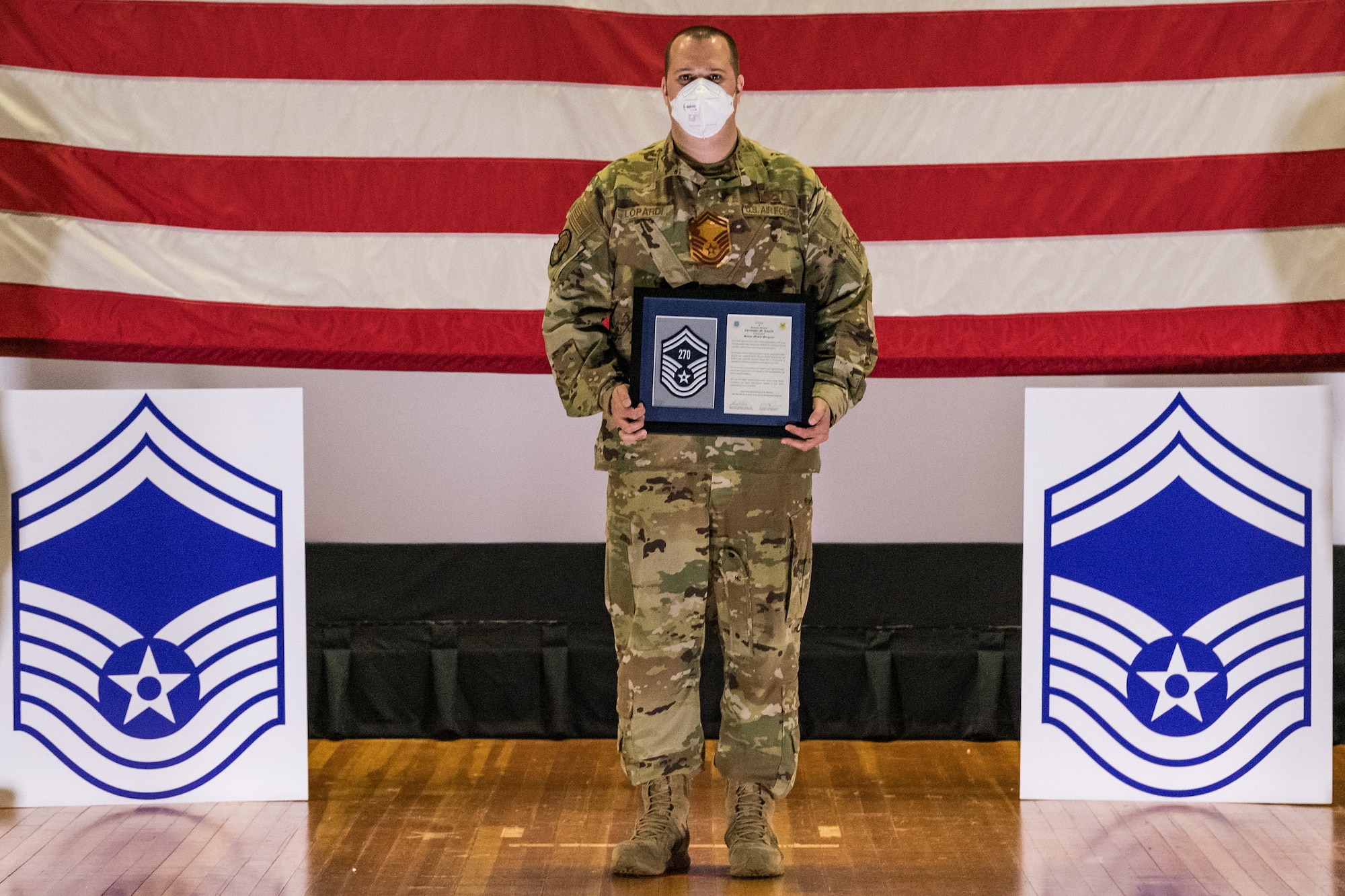 Master Sgt. Christopher Lopardi, 436th Civil Engineer Squadron assistant chief of training, poses for a photo during the senior master sergeant promotion release ceremony held at the base theater on Dover Air Force Base, Delaware, March 26, 2021. Lopardi was one of 10 master sergeants at Dover AFB selected for promotion to senior master sergeant in the 21E8 promotion cycle. (U.S. Air Force photo by Roland Balik)