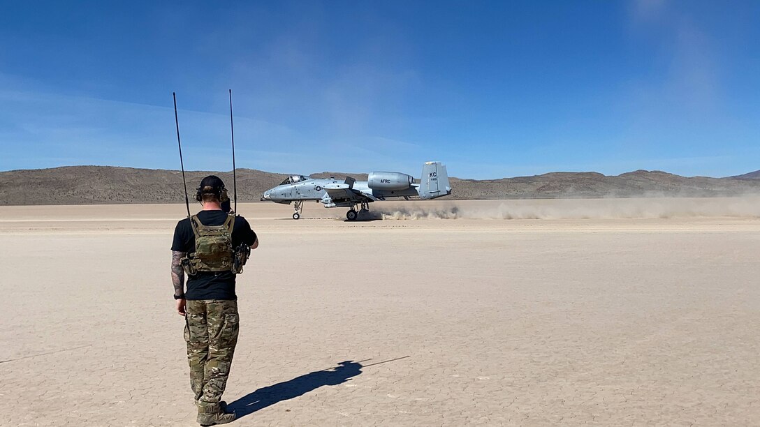 An A-10C Thunderbolt II pilot integrates with U.S.A.F. combat controllers while landing on the Delamar lakebed near Las Vegas, Nev. March 5, 2021.