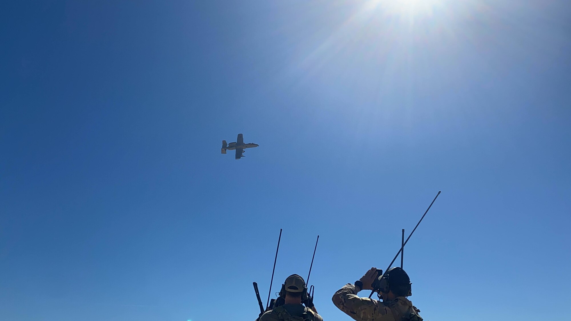 An A-10C Thunderbolt II integrates with U.S.A.F. combat controllers before landing on the Delamar lakebed near Las Vegas, Nev. March 5, 2021.