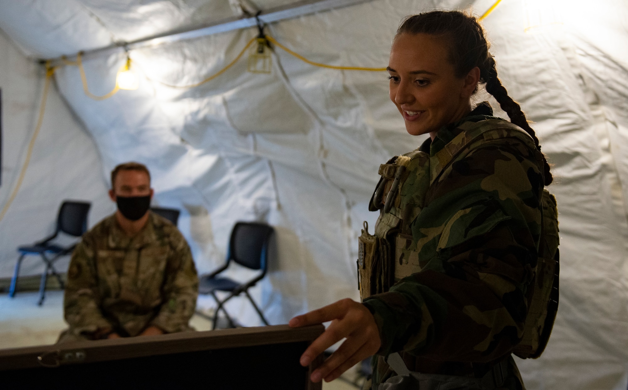 U.S. Air Force Airman 1st Class Maria Daneault, an emergency management apprentice assigned to the 36th Civil Engineer Squadron, instructs a student on Chemical, Biological, Radiological, Nuclear and Explosives defense training at Andersen Air Force Base, Guam, March 25, 2021.