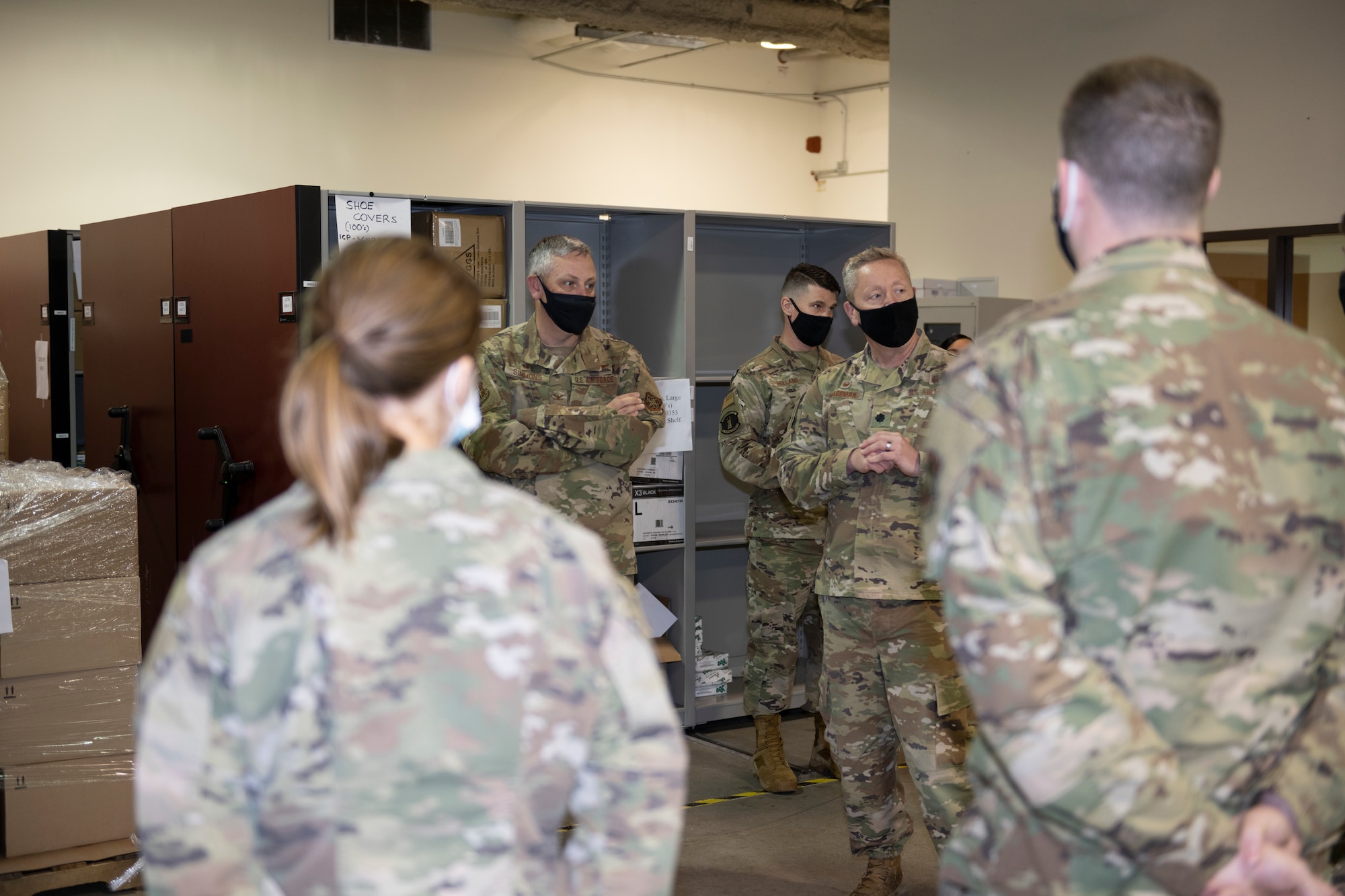 U.S. Air Force Col. Corey Simmons, 60th Air Mobility Wing commander, interacts with 60th Medical Support Squadron Airmen during Leadership Rounds March 26, 2021, at Travis Air Force Base, California. The Leadership Rounds program provides 60th AMW leadership an opportunity to interact with Airmen and receive a detailed view of each mission performed at Travis AFB. (U.S. Air Force photo by Senior Airman Cameron Otte)