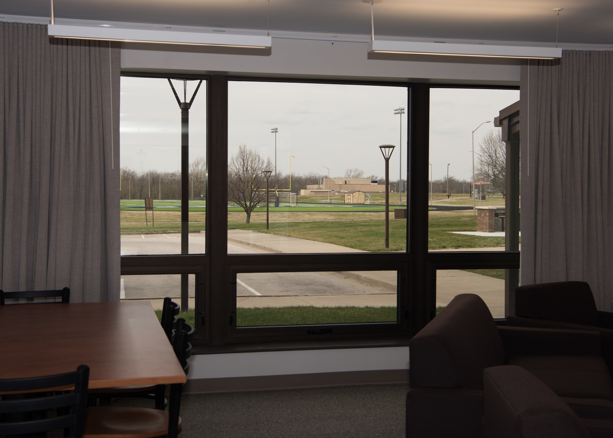 The dayroom at Endeavour Hall has large open windows for Airmen to look out of.