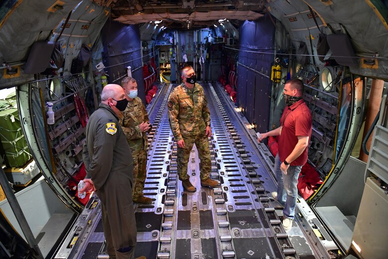 Airmen tour a fuselage trainer.
