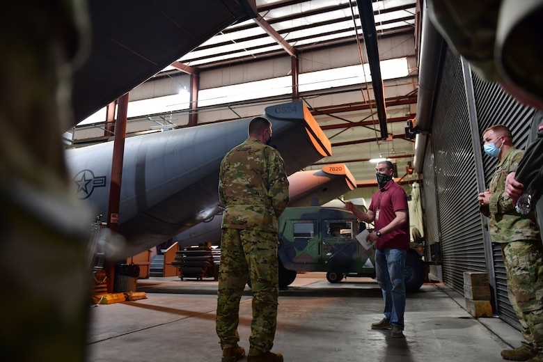 Airman receives overview of fuselage trainer.