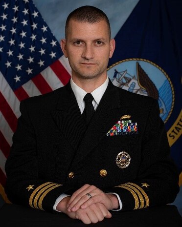 Studio portrait of Cmdr. Adam Stein