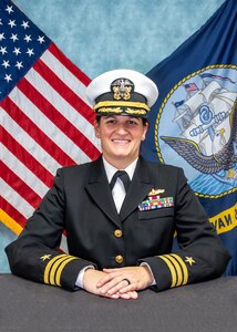 Studio portrait of Cmdr. Kari Yakubisin