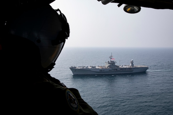 U.S. 7th Fleet flagship USS Blue Ridge (LCC 19) along with embarked MH-60S Sea Hawk helicopters assigned to Helicopter Sea Combat Squadron (HSC) 12, conduct a bilateral exercise with Japan Maritime Self-Defense Force (JMSDF) guided-missile destroyer JS Kongo (DDG-173) March 29, 2021 in the East China Sea. These types of operations provide an opportunity for each partner nation to share their unique capabilities in shipboard maneuvering procedures, maritime skills and interoperability. Blue Ridge is the oldest operational ship in the Navy and, as 7th Fleet command ship, actively works to foster relationships with allies and partners in the Indo-Pacific region.