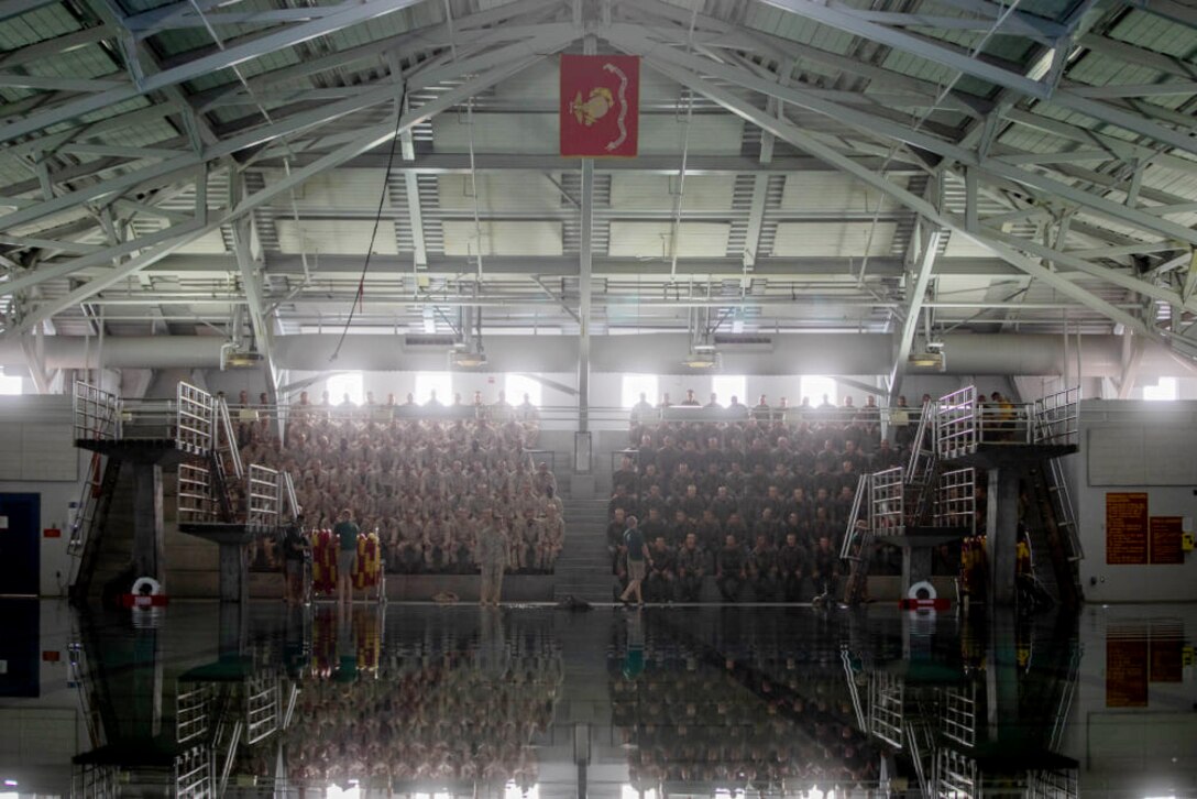 Recruits with Echo Company, 2nd Recruit Training Battalion, participate in the Water Survival Basic Qualification course at Marine Corps Recruit Depot San Diego, March 22, 2021.