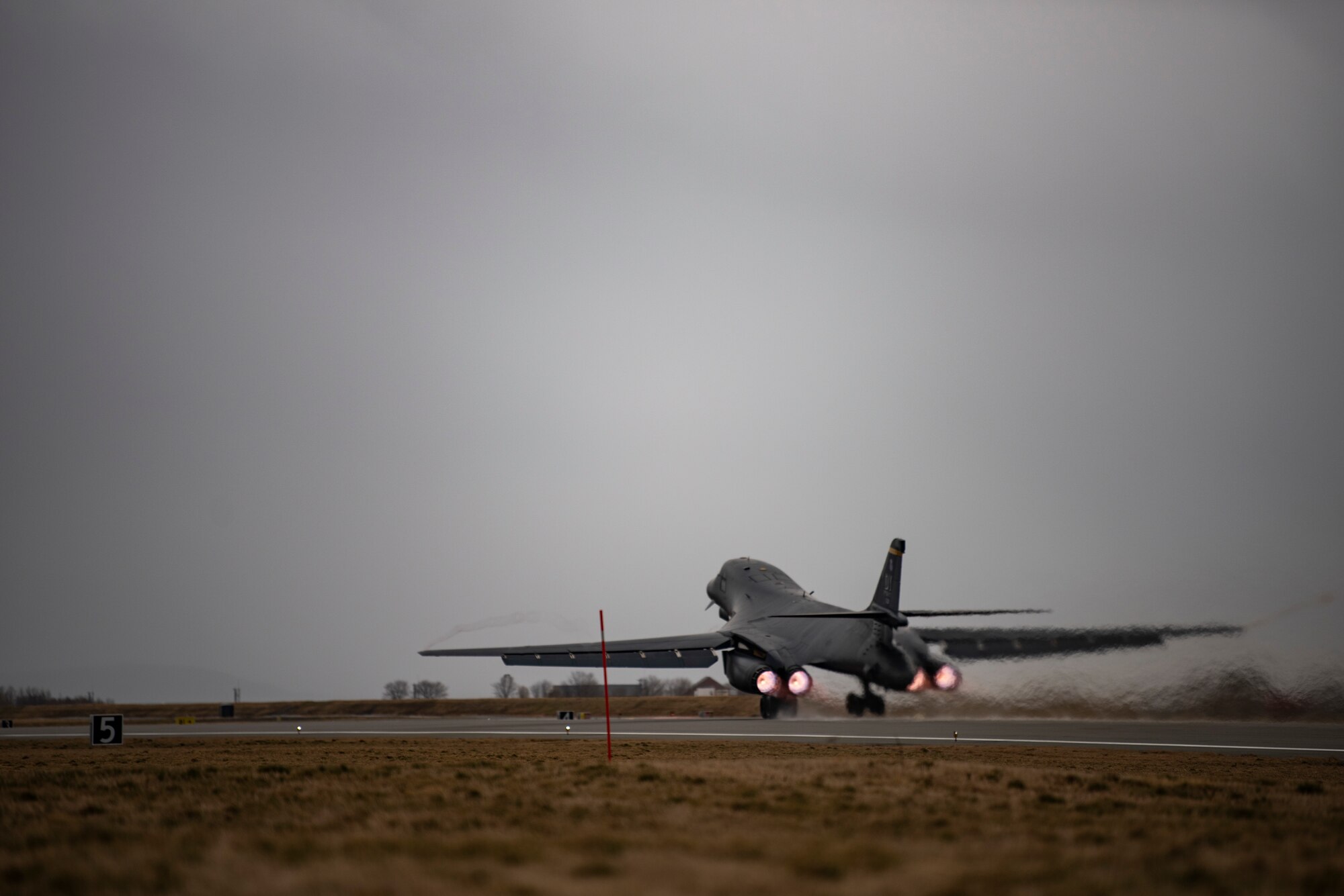 A B-1B Lancer assigned to the 9th Expeditionary Bomb Squadron departs Ørland Air Force Station, Norway, March 22, 2021. The 9th EBS completed a Bomber Task Force deployment where they operated out of Ørland AFS. Bomber Task Force missions help maintain global stability and security while enabling units to become familiar with operations in different regions. (U.S. Air Force photo by Airman 1st Class Colin Hollowell)