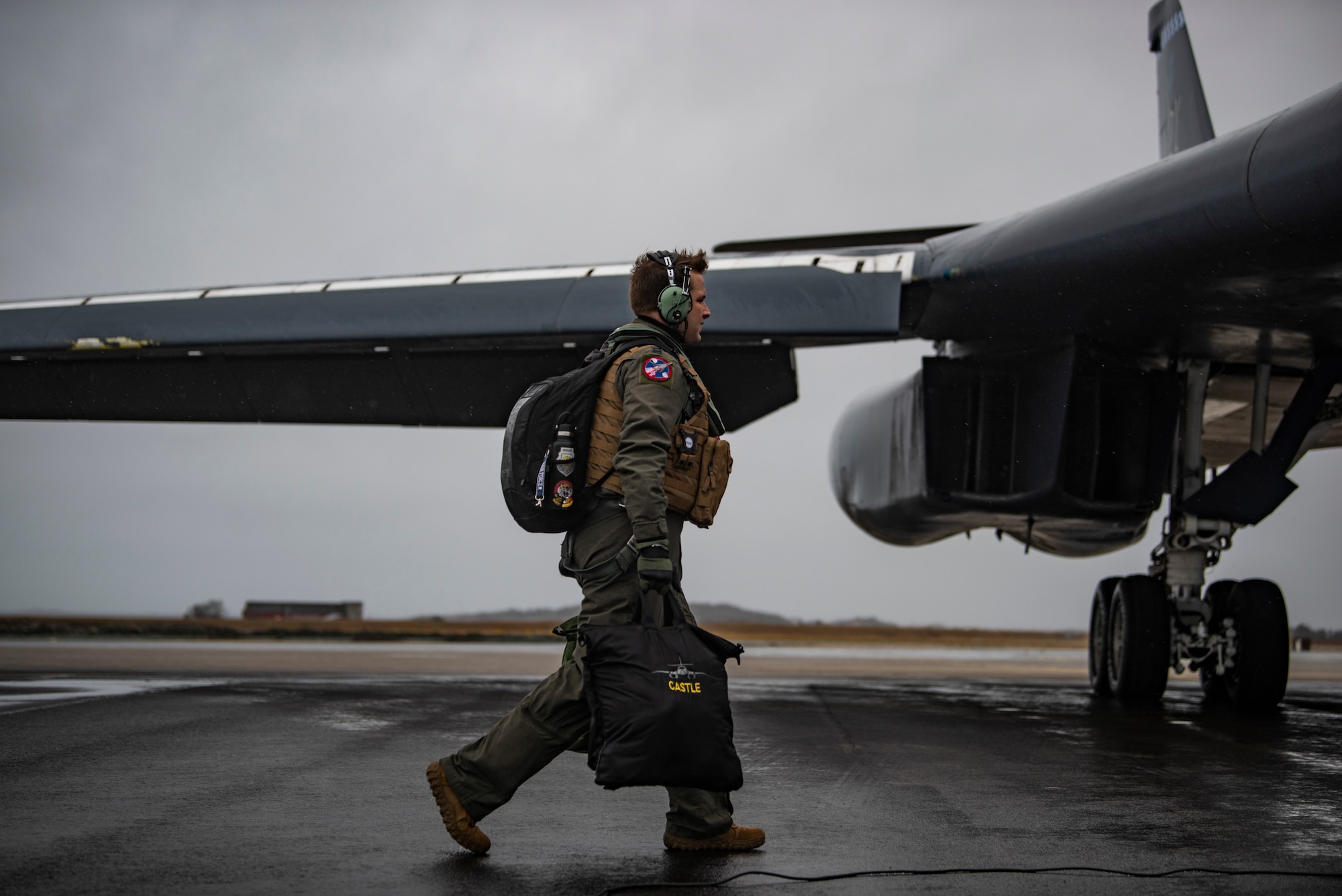 A pilot assigned to the 9th Expeditionary Bomb Squadron steps toward a B-1B Lancer at Ørland Air Force Station, Norway, March 23, 2021. During the Bomber Task Force Europe deployment, the 9th EBS successfully integrated with 11 NATO ally and partner nations. (U.S. Air Force photo by Airman 1st Class Colin Hollowell)