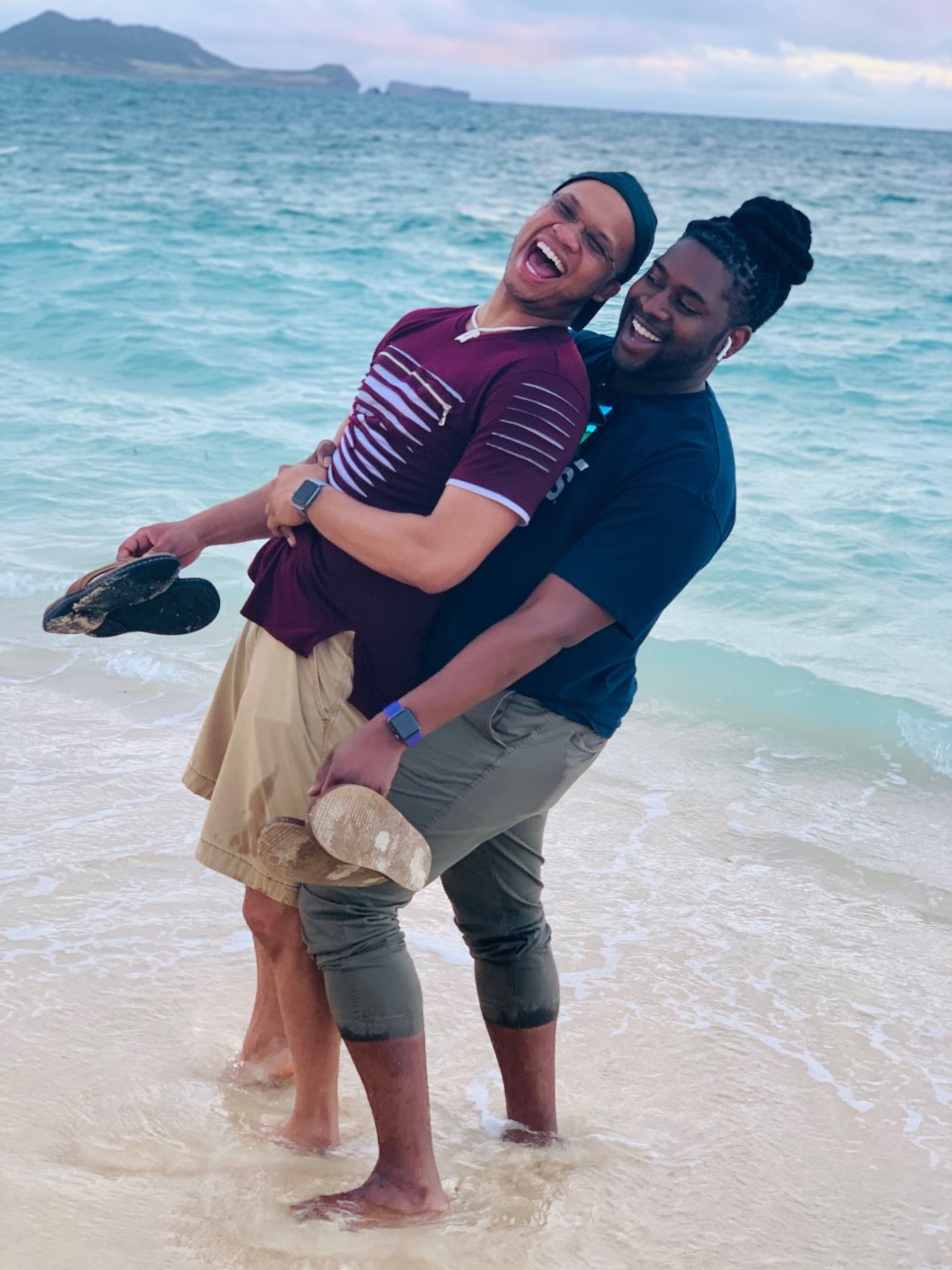 Mario and Monte Foreman-Powell pose for a photo together on vacation.