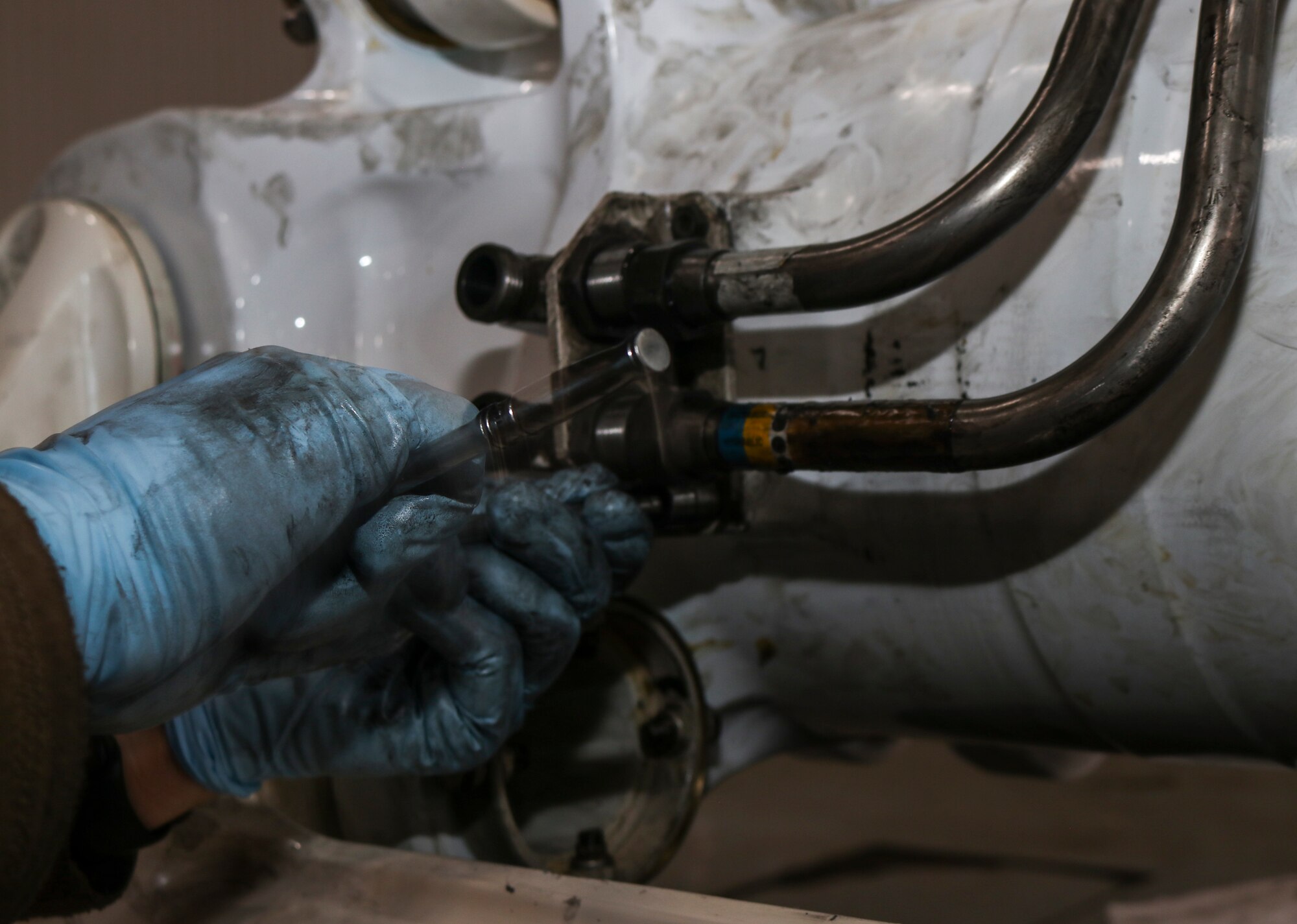 7th EMS Airmen repair main landing gear strut