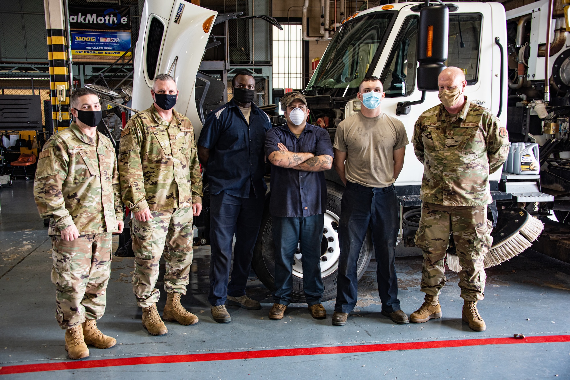 NEW CASTLE AIR NATIONAL GUARD BASE, Del.— Airmen from the 166th Logistical Readiness Squadron’s vehicle maintenance work on an International Tymco Street Sweeper inside the vehicle maintenance shop on 26-March-2021. This truck is one of the 99 varied vehicles they are called on to maintain. (U.S. Air National Guard photo by Mr. Mitch Topal)