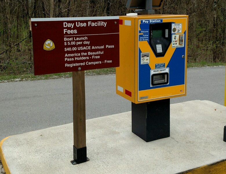 Self-serve fee collection station