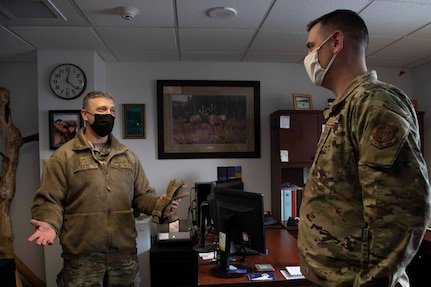 Maj. Gen. Torrence Saxe, adjutant general of the Alaska National Guard speaks with Chief Master Sgt. Jeffrey Porter during a visit to Eielson Air Force Base, Alaska, March 23, 2021. (U.S. Army National Guard photo by Victoria Granado)