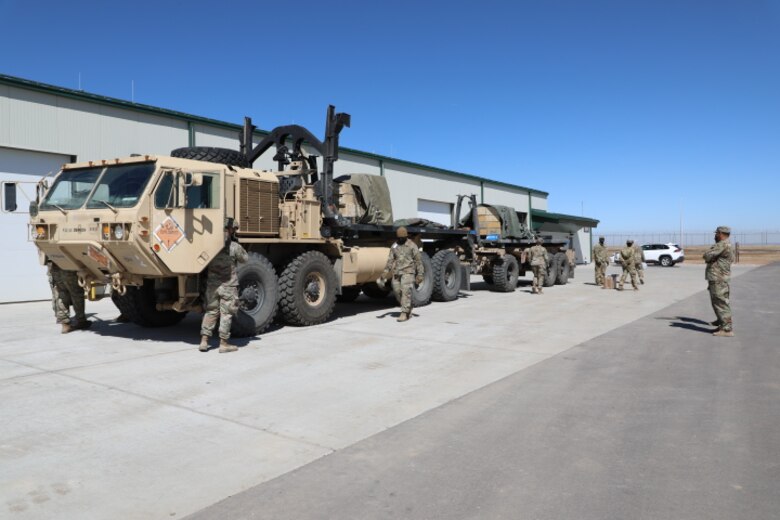 Soldiers from the 138th Infantry Battalion, 1st Striker Brigade turn in extra ammunition at the new ammunition inspection facility on Fort Carson, CO, March 19