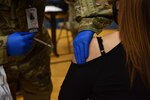 Goodfellow member receives vaccination at the Mathis Fitness Center on Goodfellow Air Force Base, Texas, March 19, 2021. In March, vaccines opened to TRICARE beneficiaries and dependents of those members who work on base. (U.S. Air Force photo by Staff Sgt. Seraiah Wolf)