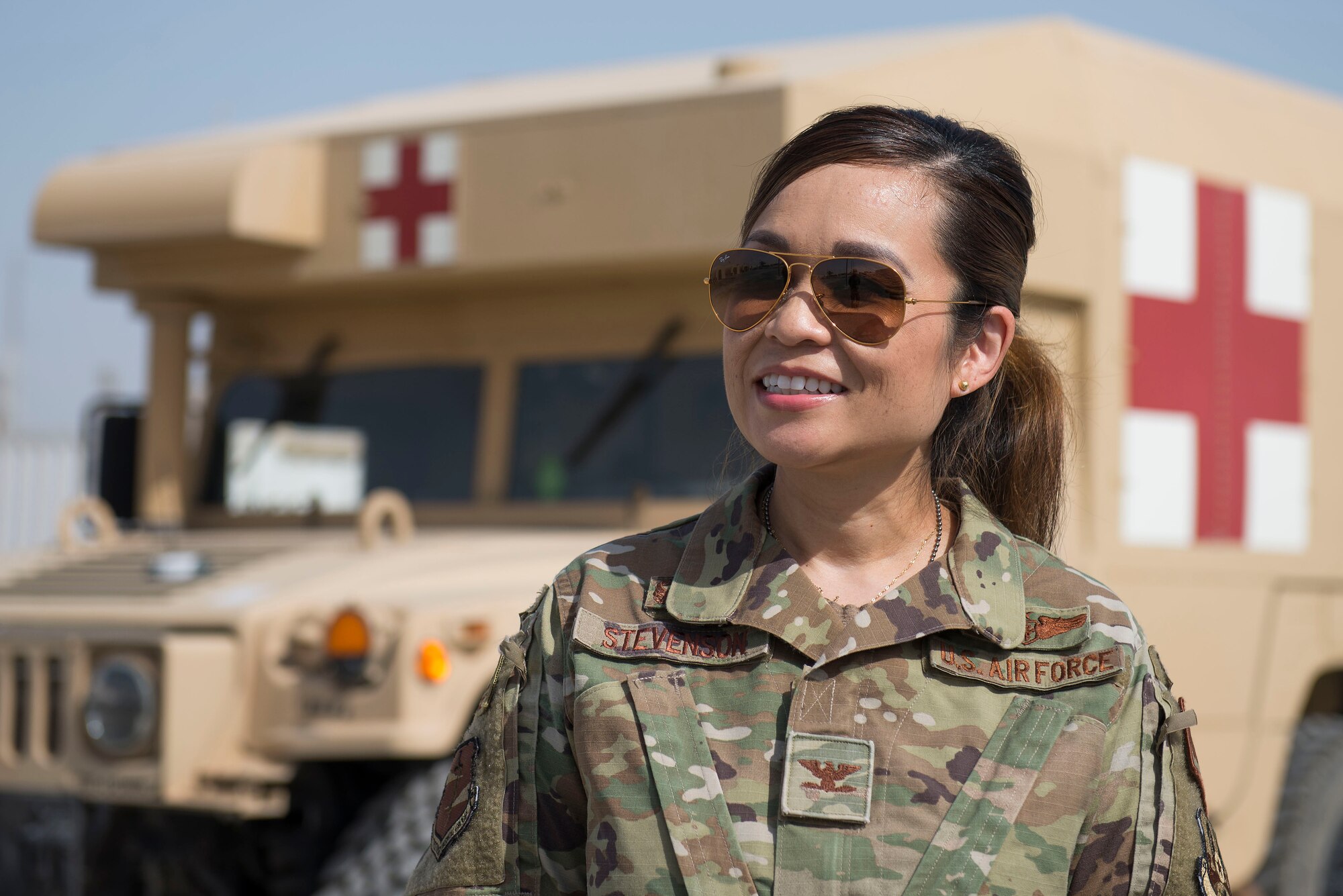 U.S. Air Force Col. Bonnie Stevenson, 380th Expeditionary Medical Group commander stands outside the medical clinic at Al Dhafra Air Base, United Arab Emirates, March 24, 2021. Stevenson joined the U.S. Air Force in 1996 after graduating from nursing school at the University of Texas Health Science Center. (U.S. Air Force photo by Staff Sgt. Zade Vadnais)