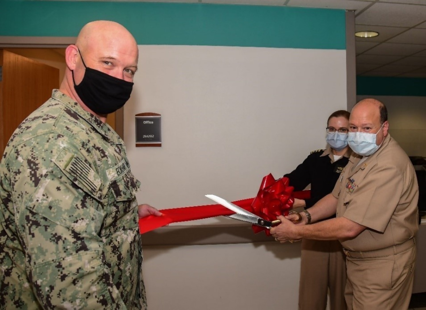 Naval Medical Center Portsmouth (NMCP) held a ribbon cutting ceremony to celebrate the opening of their new Traumatic Brain Injury (TBI) services department clinic, March 19.