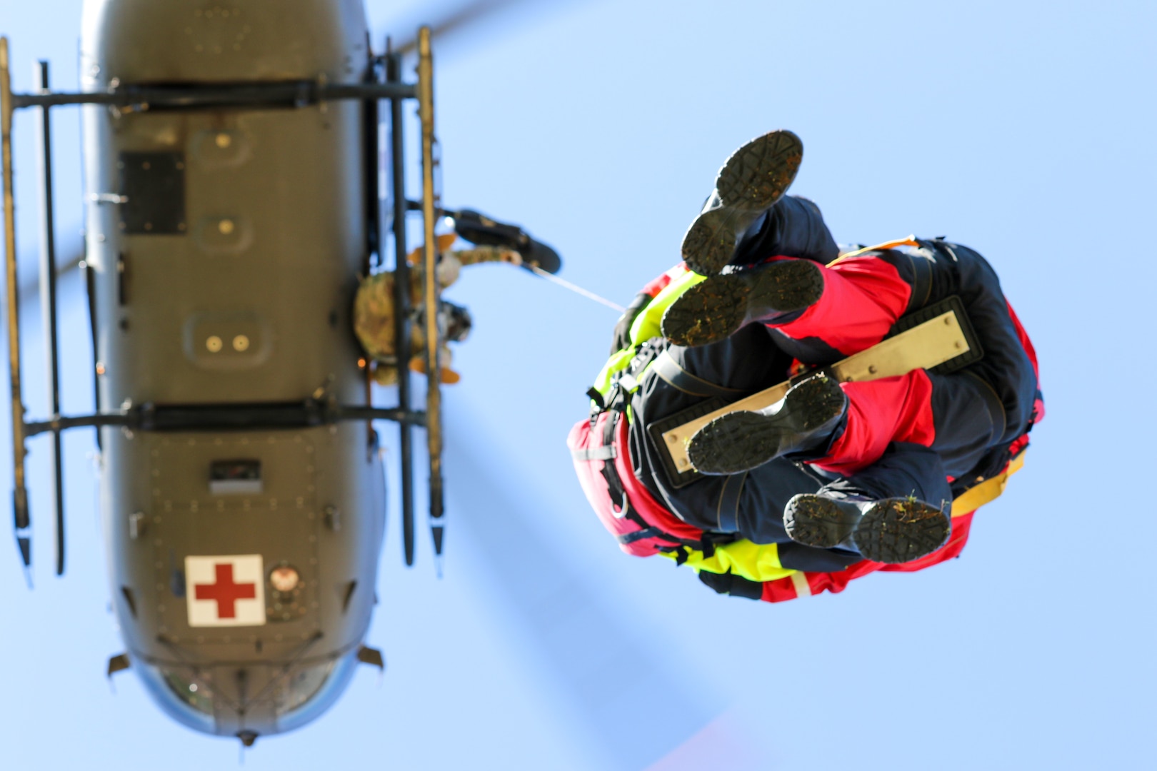 Firefighters with Mississippi Task Force Urban Search and
Rescue ride hoist to UH-72 Lakota while participating in Patriot
South 20, at Guardian Centers in Perry, Georgia, February 28,
2020 (U.S. Army National Guard/Christopher Shannon)