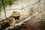 Marine Candidate participates in fire team assault course at Officer Candidates School, Marine Corps Base Quantico, Virginia, June 17, 2017 (U.S. Marine Corps/Cristian L. Ricardo)