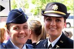Marit Duffy (right), former U.S. Army Radiologist, is the sister of Air Force Maj. Courtney Barnett (left), who is currently deployed as the chief of command and control/Intelligence, Surveillance and Reconnaissance, U.S. Air Forces Central Operations, Al Udeid Air Base, Qatar. Duffy is pictured here at her medical school graduation. Barnett’s aunt, cousin and mother are three of the women in Barnett’s family who chose to fol-low in their grandmother’s footsteps to serve in the U.S. military. (Courtesy photo).