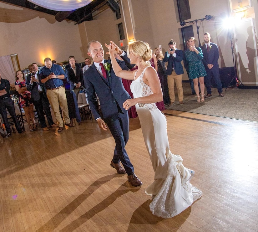 A man and woman dance.