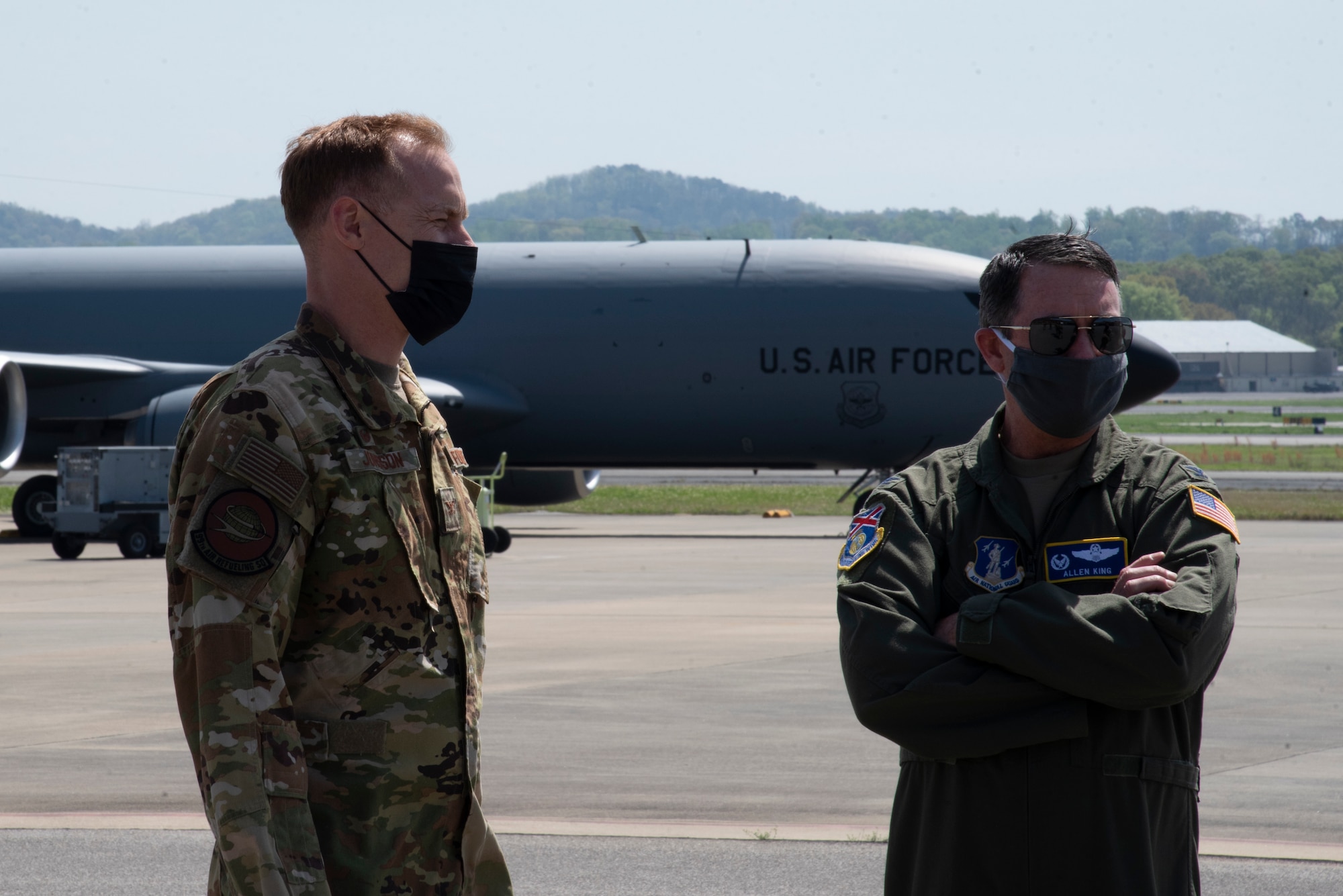 U.S. Air Force Col. Ben Jonsson, 6th Air Refueling Wing commander, and Col. Allen King, 117th ARW commander stand on the flight line at Sumpter Smith Joint National Guard Base, in Birmingham, Ala., March 30, 2021.