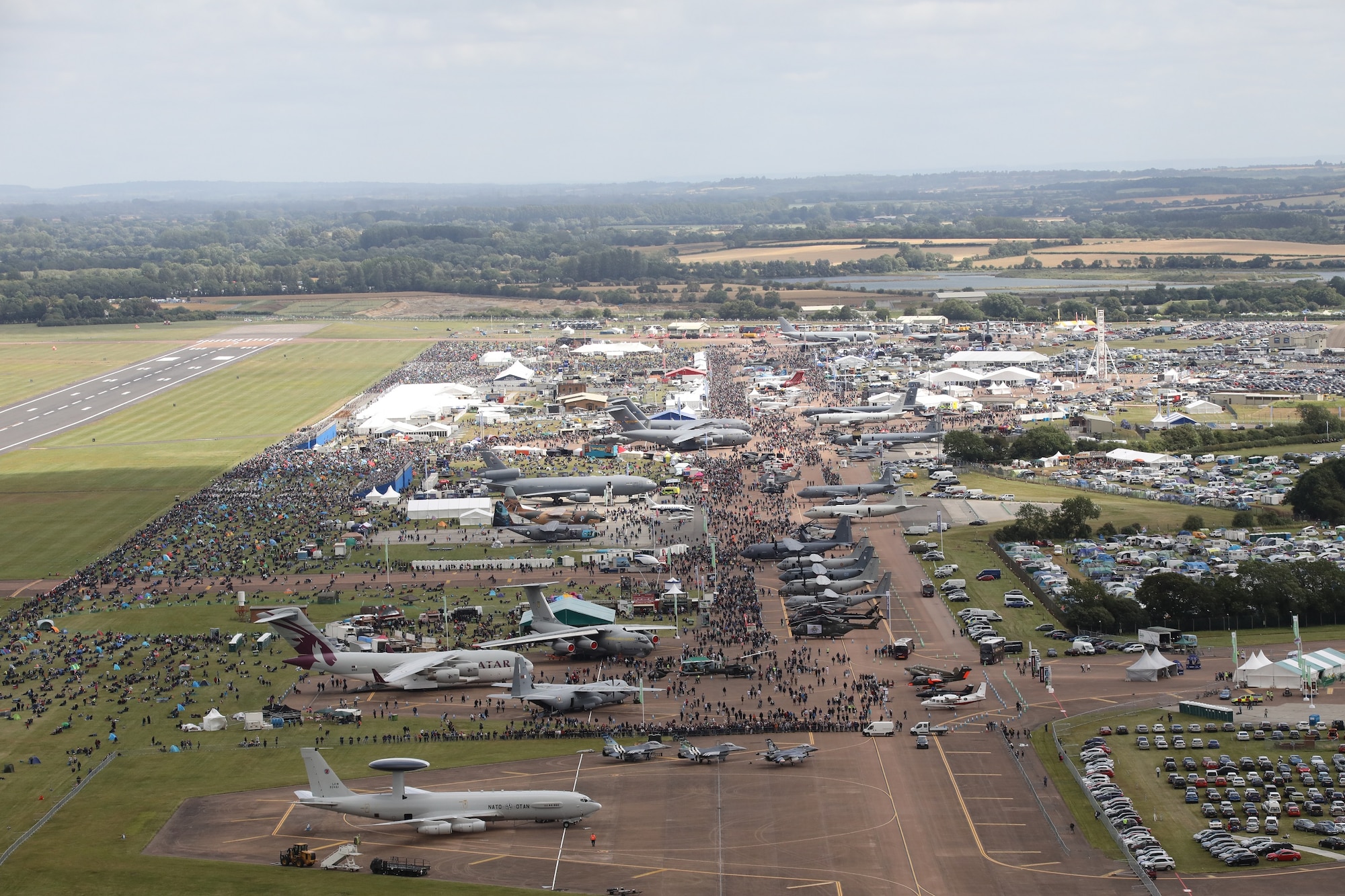 Thousands of attendees view static displays of aircraft from NATO allies and partner nations during the 2019 Royal International Air Tattoo at RAF Fairford, England, July 20, 2019. This year, RIAT commemorated the 70th anniversary of NATO and highlighted the United States' enduring commitment to its European allies. RIAT is the largest military airshow in the world and is held at RAF Fairford annually. (Courtesy photo)