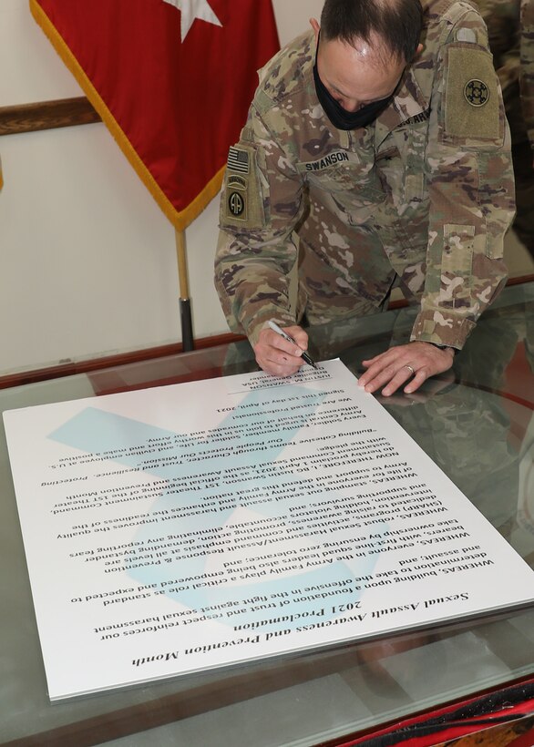 Army Reserve general signs April SAAPM proclamation at Camp Arifjan, Kuwait