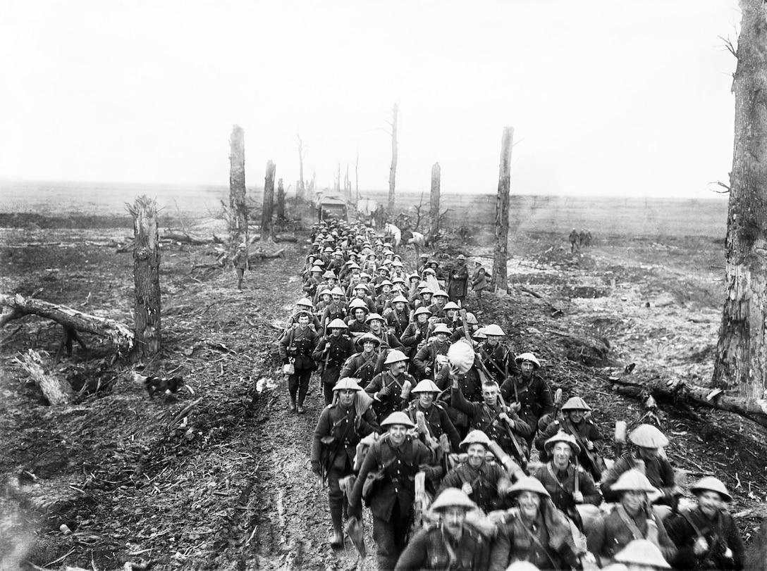 Men of the Nottinghamshire and Derbyshire Regiment (The Sherwood Foresters) marching along Amiens-St. Quentin  Road, from Foucancourt, near Brie, Somme, March 1917, after German withdrawl to Hindenberg Line (Courtsey Imperial War Museum/Ernest Brooks)