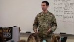 Capt. Jonathan Bratten, command historian for the Maine National Guard, gives a presentation in 2020 to a high school history class as part of the Maine Army National Guard's History Outreach Program. Bratten has been selected as the U.S. Army Center of Military History's first scholar in residence.