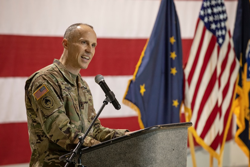 Col. Tim Brower, commander of 38th Troop Command, Alaska Army National Guard, gives a speech during a change of responsibility ceremony on Joint Base Elmendorf-Richardson, Alaska, March 30. Command Sgt. Maj. John Phlegar assumed the role as the senior enlisted leader from Command Sgt. Maj. Maureen Meehan, making Phlegar the senior noncommissioned officer in charge of the brigade. (U.S. Army National Guard photo by Edward Eagerton)