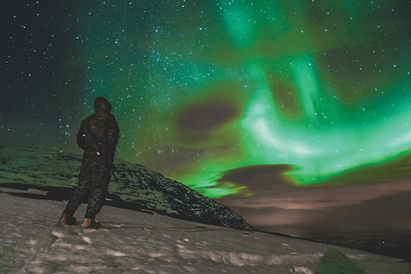 U.S. Marine with Marine Rotational Force-Europe 21.1, Marine Forces Europe and Africa, stands watch during cold weather training in preparation for Exercise Reindeer II, in Setermoen, Norway, November 12, 2020 (U.S. Marine Corps/William Chockey)