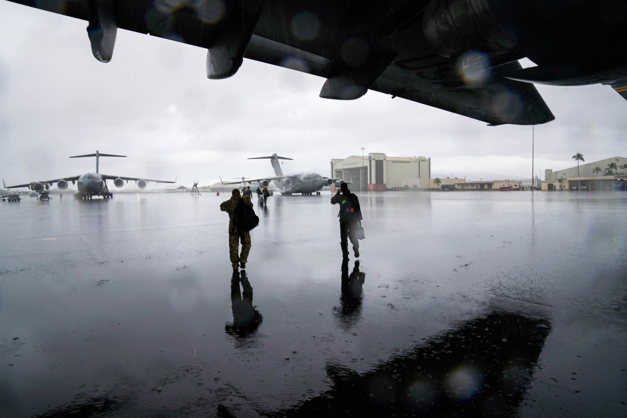 Aircrew from 535th Airlift Squadron aboard a C-17 Globemaster before a training mission around the Hawaiian Islands March 25, 2021. Women from the 535th Airlift Squadron conducted an all-female flight in honor of Women’s History Month celebrating the contributions of female airmen. Women first entered pilot training in 1976 and currently make up 21 percent of the Air Force. (U.S. Air Force photo by Airman 1st Class Makensie Cooper)