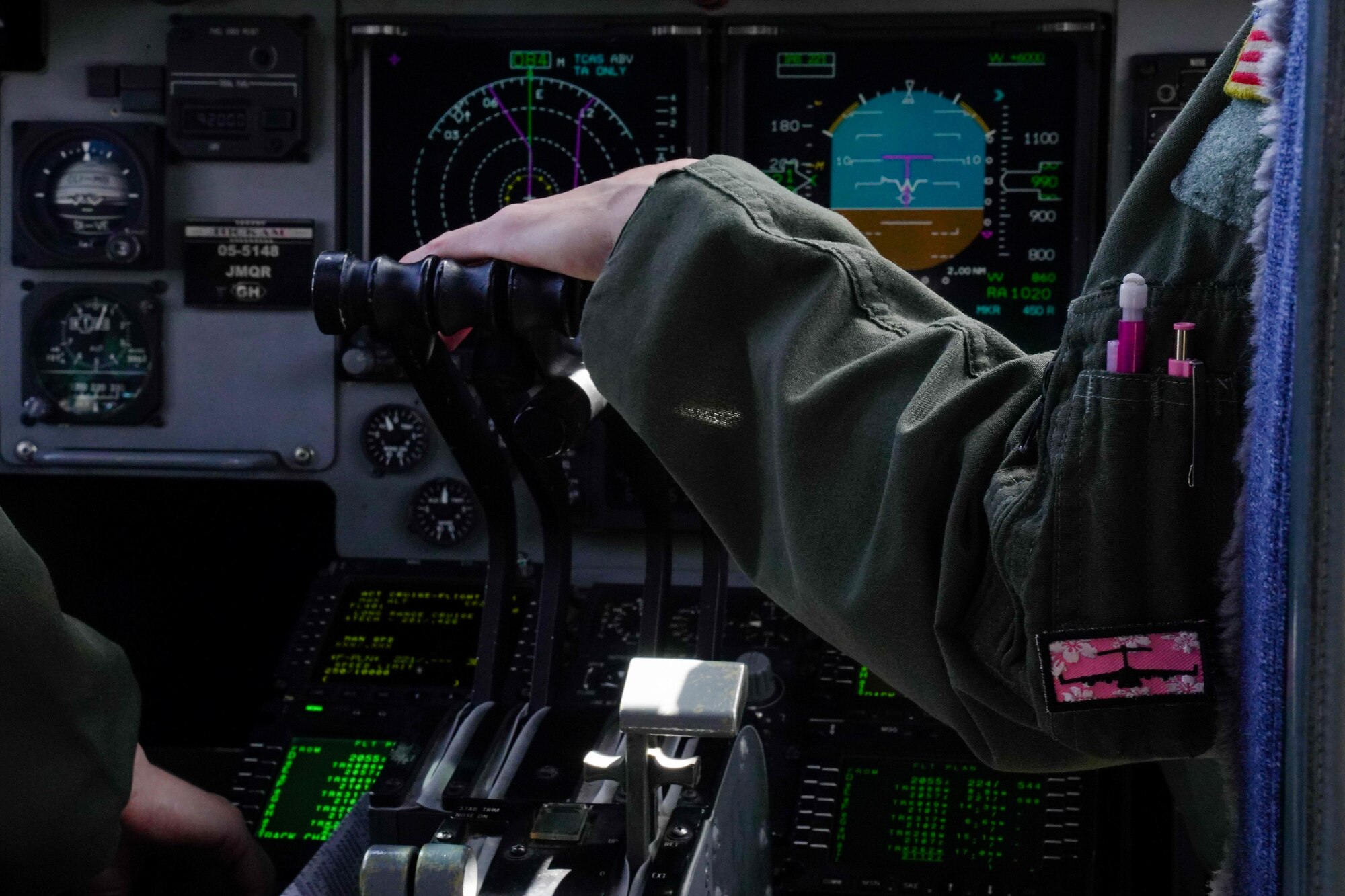Maj. Jacqueline Cushing, 535th Airlift Squadron instructor pilot, adjusts controls on a C-17 Globemaster during a training mission around the Hawaiian Islands March 25, 2021. Women from the 535th Airlift Squadron conducted an all-female flight in honor of Women’s History Month celebrating the contributions of female airmen. Women first entered pilot training in 1976 and currently make up 21 percent of the Air Force. (U.S. Air Force photo by Airman 1st Class Makensie Cooper)