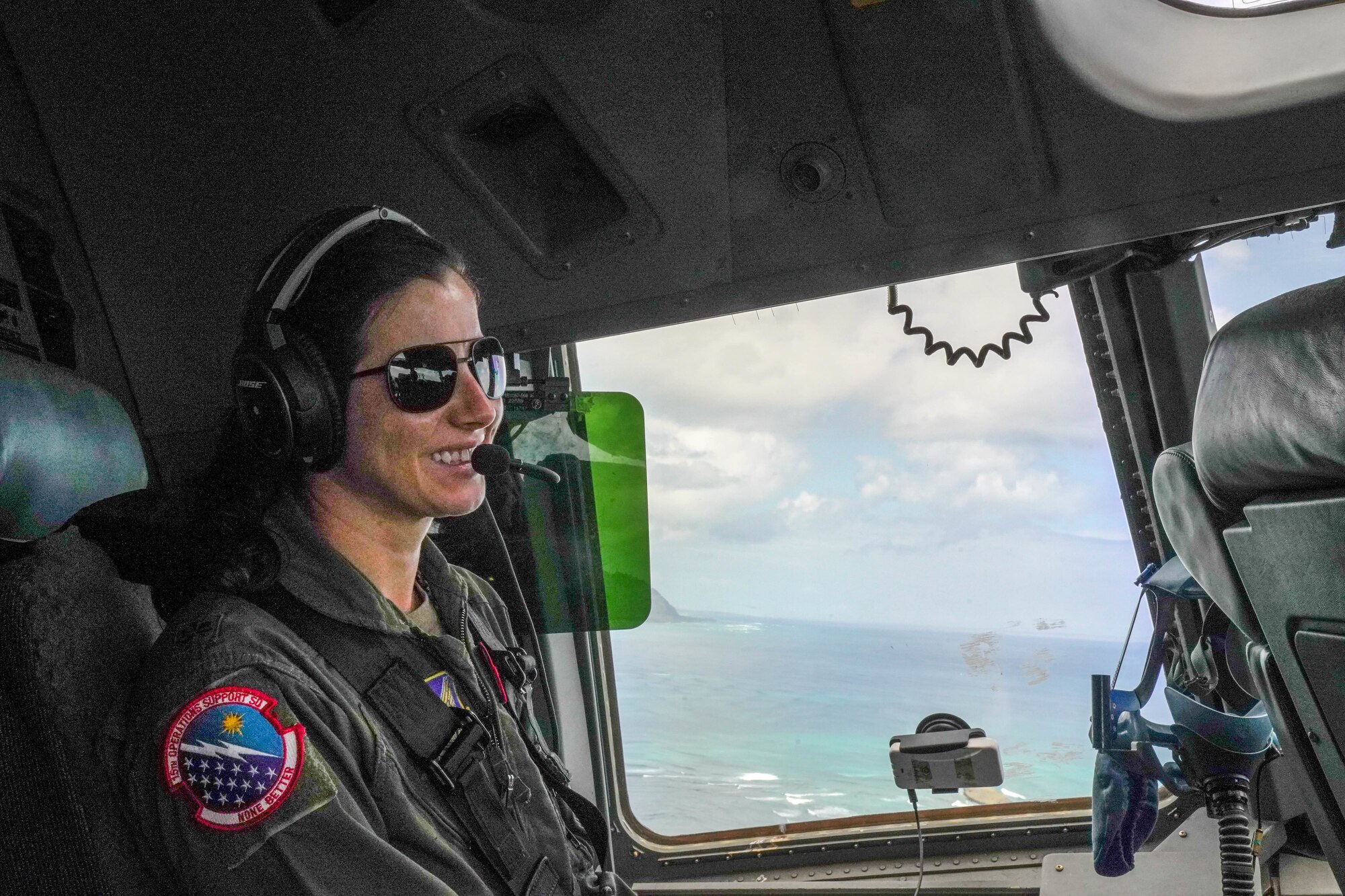 Maj. Cari Piha, 535th Airlift Squadron instructor pilot, conducts an all-female C-17 Globemaster flight training mission around the Hawaiian Islands March 25, 2021. Women from the 535th Airlift Squadron conducted an all-female flight in honor of Women’s History Month celebrating the contributions of female airmen. Women first entered pilot training in 1976 and currently make up 21 percent of the Air Force. (U.S. Air Force photo by Airman 1st Class Makensie Cooper)